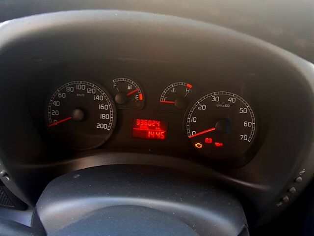 Белый Фиат Добло, объемом двигателя 1.3 л и пробегом 380 тыс. км за 5000 $, фото 1 на Automoto.ua