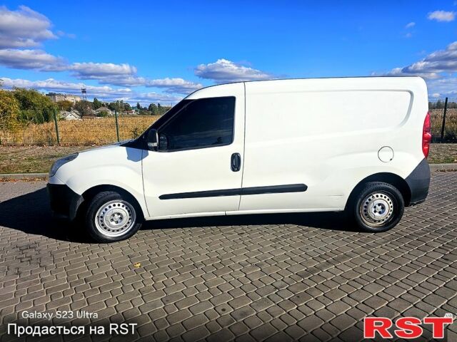 Белый Фиат Добло, объемом двигателя 1.4 л и пробегом 281 тыс. км за 4900 $, фото 1 на Automoto.ua