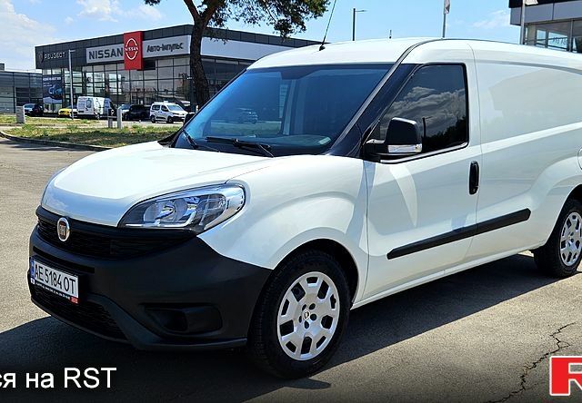 Белый Фиат Добло, объемом двигателя 1.3 л и пробегом 98 тыс. км за 10100 $, фото 1 на Automoto.ua