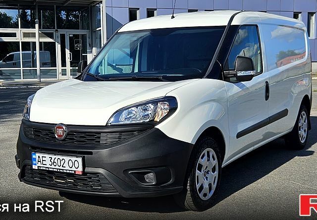 Белый Фиат Добло, объемом двигателя 1.3 л и пробегом 53 тыс. км за 12500 $, фото 1 на Automoto.ua