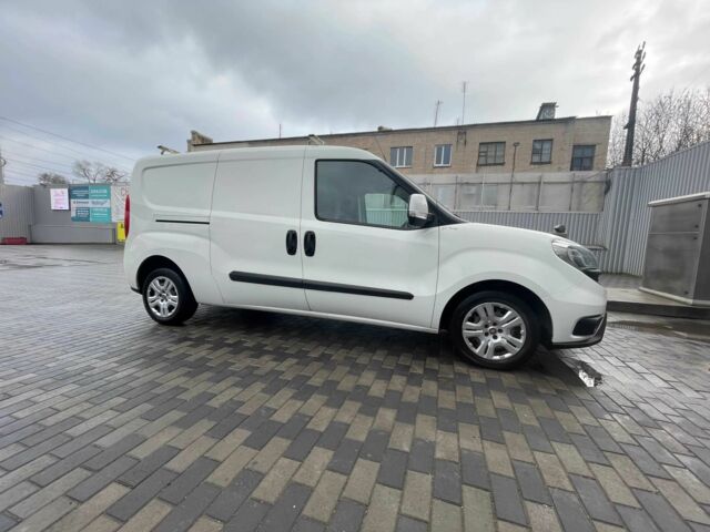 Белый Фиат Добло, объемом двигателя 1.6 л и пробегом 177 тыс. км за 9400 $, фото 1 на Automoto.ua