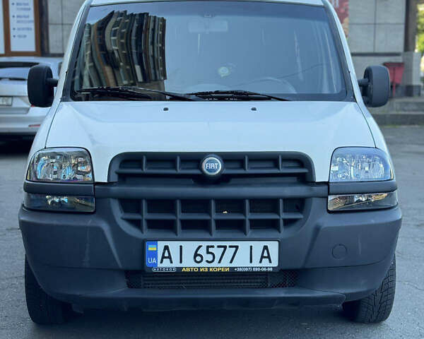 Белый Фиат Добло, объемом двигателя 1.91 л и пробегом 270 тыс. км за 3000 $, фото 1 на Automoto.ua