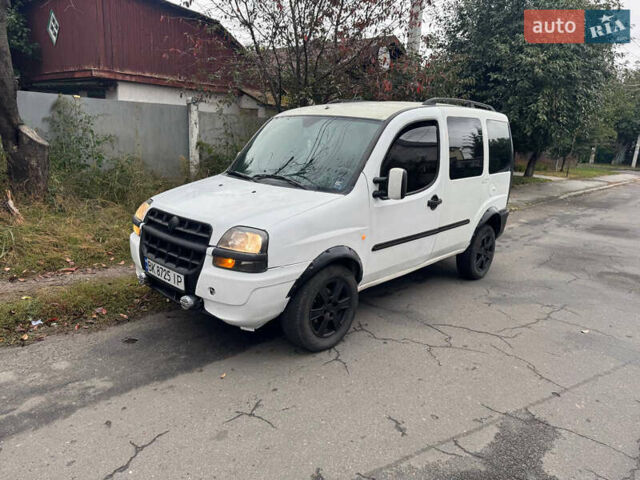 Белый Фиат Добло, объемом двигателя 1.3 л и пробегом 250 тыс. км за 3000 $, фото 1 на Automoto.ua