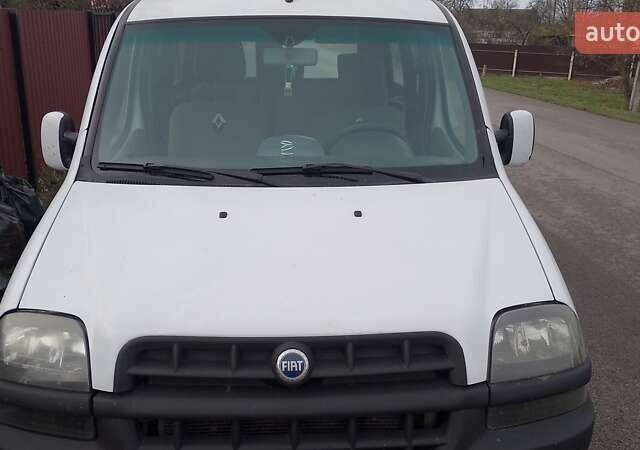 Белый Фиат Добло, объемом двигателя 1.91 л и пробегом 280 тыс. км за 3700 $, фото 1 на Automoto.ua