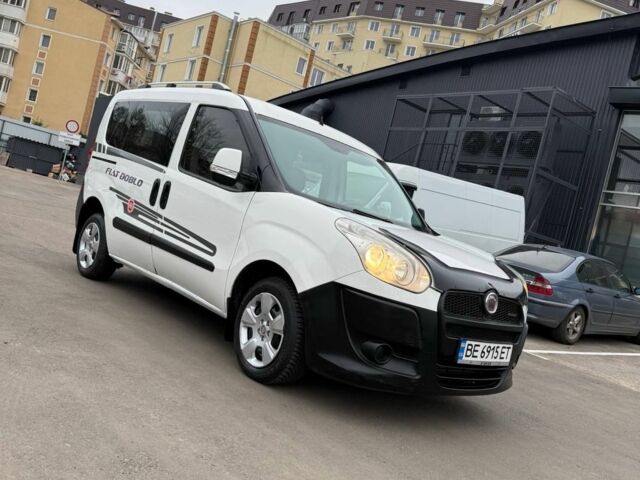 Белый Фиат Добло, объемом двигателя 1.2 л и пробегом 220 тыс. км за 5999 $, фото 1 на Automoto.ua