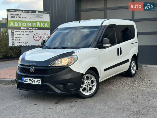 Белый Фиат Добло, объемом двигателя 1.3 л и пробегом 244 тыс. км за 8250 $, фото 1 на Automoto.ua