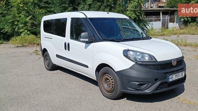 Белый Фиат Добло, объемом двигателя 1.37 л и пробегом 230 тыс. км за 9700 $, фото 1 на Automoto.ua