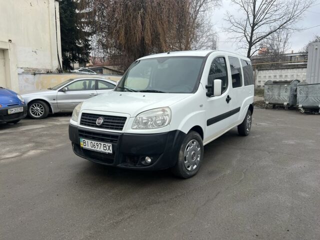 Белый Фиат Добло, объемом двигателя 1.2 л и пробегом 320 тыс. км за 5200 $, фото 1 на Automoto.ua