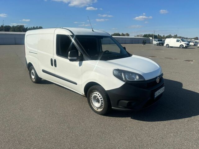 Белый Фиат Добло, объемом двигателя 1.4 л и пробегом 321 тыс. км за 7400 $, фото 1 на Automoto.ua