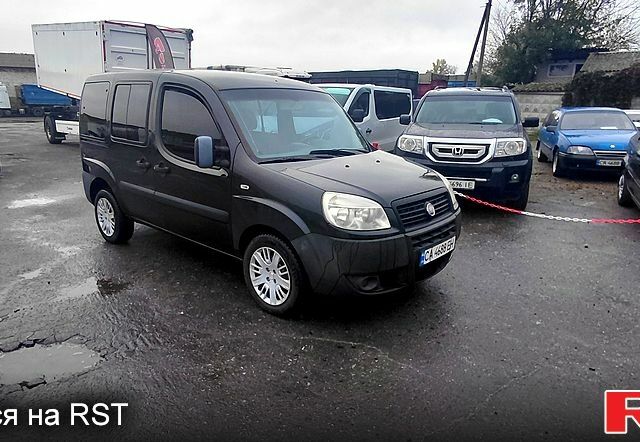 Черный Фиат Добло, объемом двигателя 1.4 л и пробегом 265 тыс. км за 3500 $, фото 1 на Automoto.ua