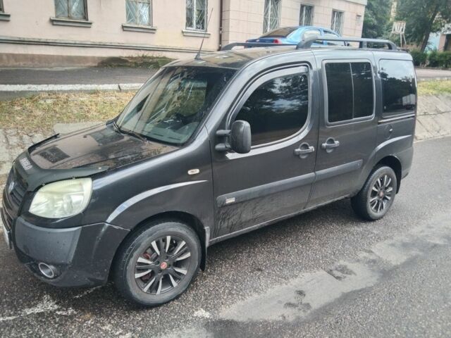 Черный Фиат Добло, объемом двигателя 1.4 л и пробегом 370 тыс. км за 4000 $, фото 1 на Automoto.ua