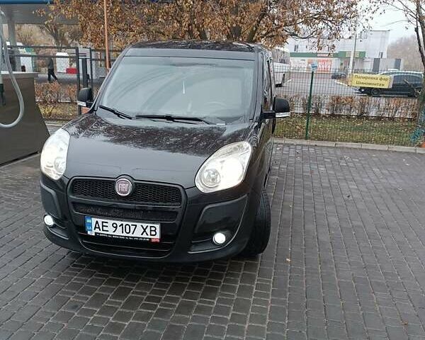 Черный Фиат Добло, объемом двигателя 1.37 л и пробегом 180 тыс. км за 6700 $, фото 1 на Automoto.ua