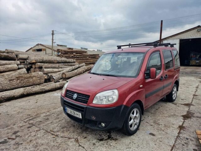 Красный Фиат Добло, объемом двигателя 1.2 л и пробегом 354 тыс. км за 3500 $, фото 1 на Automoto.ua