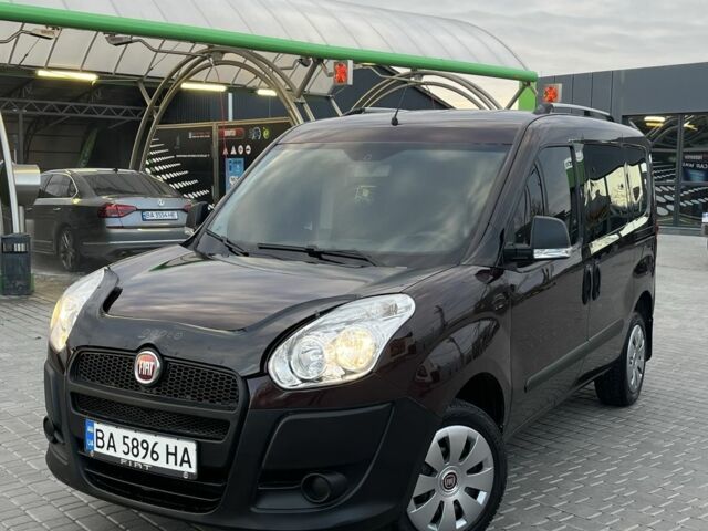 Червоний Фіат Добло, об'ємом двигуна 1.4 л та пробігом 154 тис. км за 6800 $, фото 1 на Automoto.ua