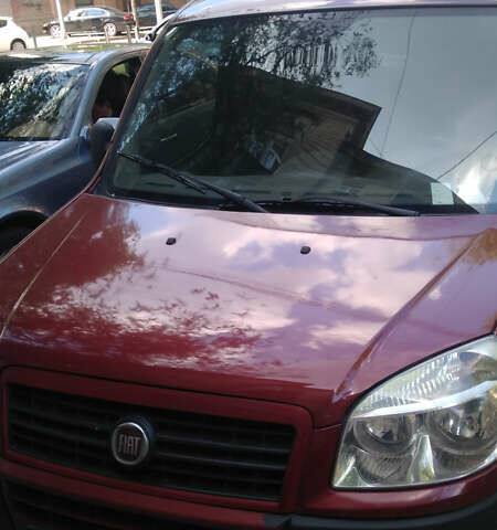 Красный Фиат Добло, объемом двигателя 1.4 л и пробегом 205 тыс. км за 7000 $, фото 1 на Automoto.ua