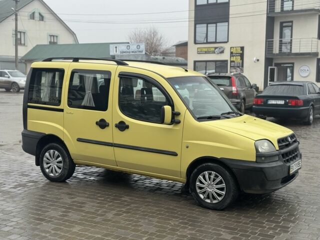 Желтый Фиат Добло, объемом двигателя 1.9 л и пробегом 260 тыс. км за 3600 $, фото 1 на Automoto.ua