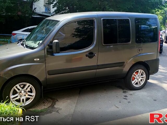 Серый Фиат Добло, объемом двигателя 1.4 л и пробегом 260 тыс. км за 4500 $, фото 1 на Automoto.ua