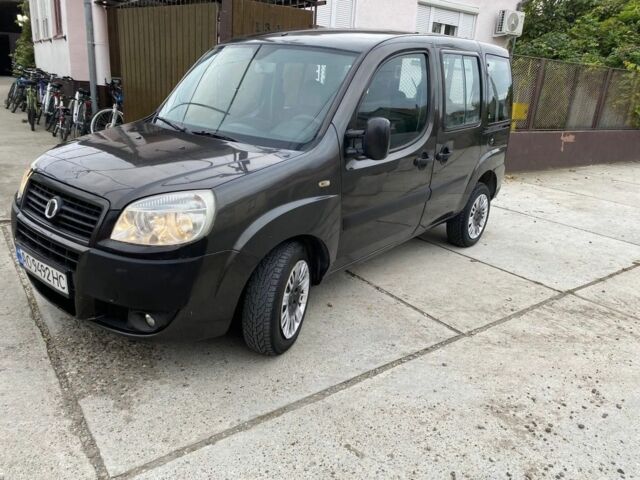 Серый Фиат Добло, объемом двигателя 1.2 л и пробегом 400 тыс. км за 3500 $, фото 1 на Automoto.ua