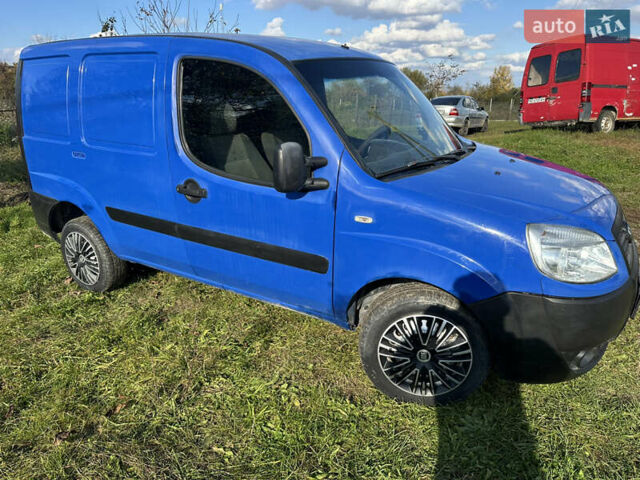 Синий Фиат Добло, объемом двигателя 1.25 л и пробегом 260 тыс. км за 2900 $, фото 1 на Automoto.ua