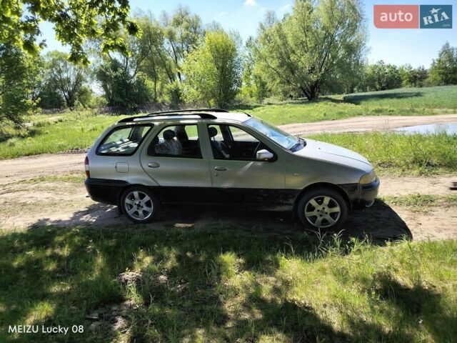Серый Фиат Палио, объемом двигателя 1.2 л и пробегом 222 тыс. км за 1788 $, фото 1 на Automoto.ua