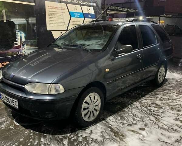 Синий Фиат Палио, объемом двигателя 1.24 л и пробегом 180 тыс. км за 2350 $, фото 1 на Automoto.ua