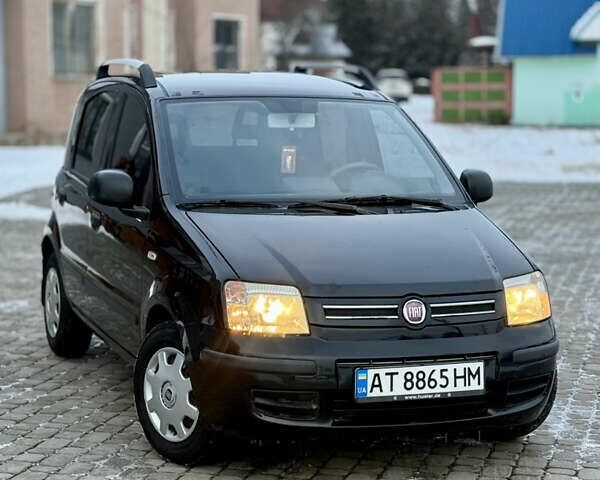 Черный Фиат Панда, объемом двигателя 1.24 л и пробегом 206 тыс. км за 3650 $, фото 1 на Automoto.ua