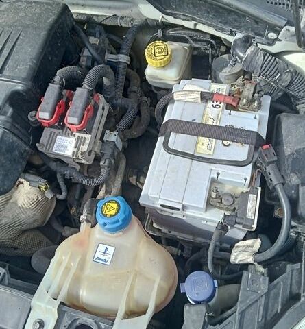 Белый Фиат Пунто, объемом двигателя 1.24 л и пробегом 237 тыс. км за 4100 $, фото 1 на Automoto.ua