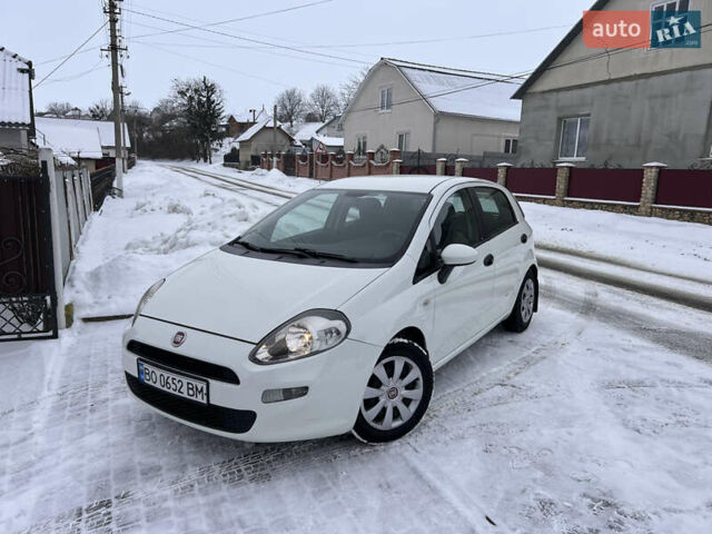 Белый Фиат Пунто, объемом двигателя 1.25 л и пробегом 265 тыс. км за 4200 $, фото 1 на Automoto.ua