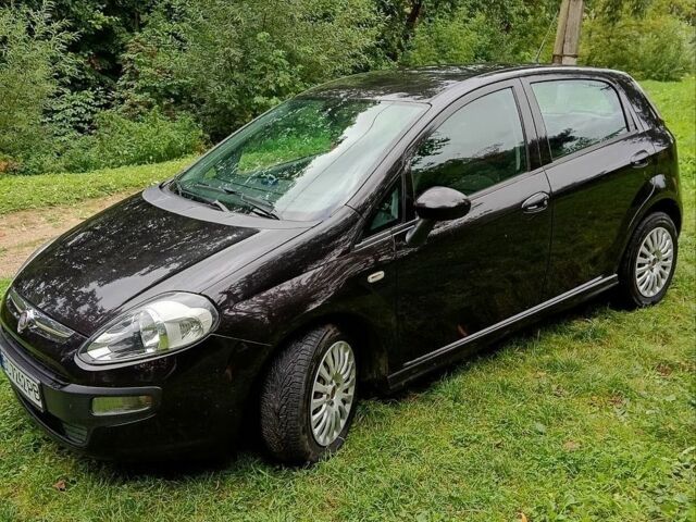 Черный Фиат Пунто, объемом двигателя 1.25 л и пробегом 217 тыс. км за 4500 $, фото 1 на Automoto.ua