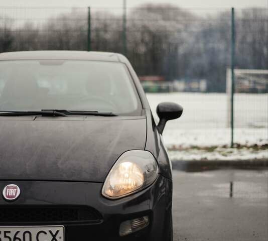 Черный Фиат Пунто, объемом двигателя 1.25 л и пробегом 230 тыс. км за 6000 $, фото 1 на Automoto.ua