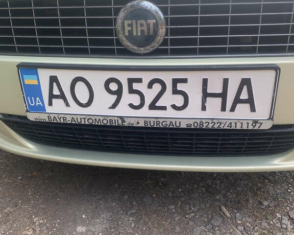 Зеленый Фиат Пунто, объемом двигателя 1.4 л и пробегом 225 тыс. км за 2800 $, фото 1 на Automoto.ua