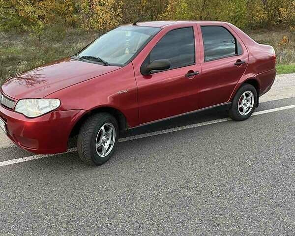 Красный Фиат Сиена, объемом двигателя 1.24 л и пробегом 175 тыс. км за 2700 $, фото 1 на Automoto.ua