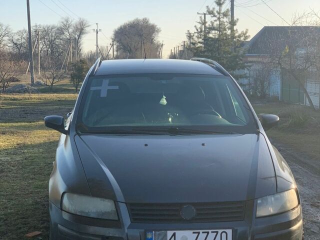 Черный Фиат Стило, объемом двигателя 1.6 л и пробегом 120 тыс. км за 1450 $, фото 1 на Automoto.ua