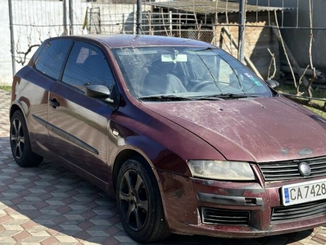 Червоний Фіат Стіло, об'ємом двигуна 1.6 л та пробігом 240 тис. км за 761 $, фото 1 на Automoto.ua