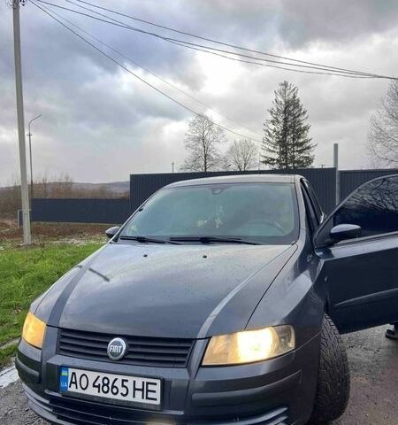 Серый Фиат Стило, объемом двигателя 1.9 л и пробегом 394 тыс. км за 2900 $, фото 1 на Automoto.ua