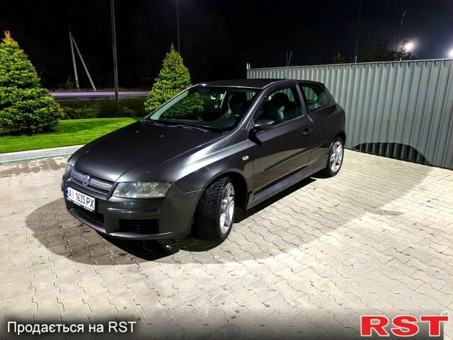 Серый Фиат Стило, объемом двигателя 2.4 л и пробегом 250 тыс. км за 4000 $, фото 1 на Automoto.ua