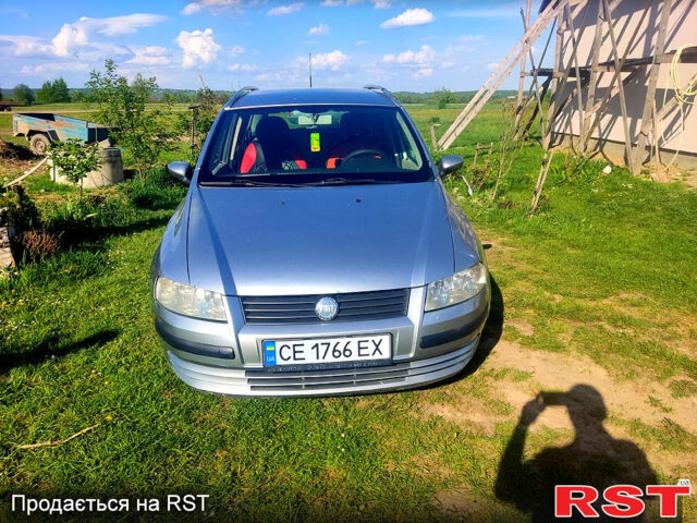 Серый Фиат Стило, объемом двигателя 1.9 л и пробегом 369 тыс. км за 3400 $, фото 1 на Automoto.ua