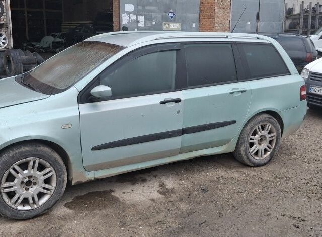 Зеленый Фиат Стило, объемом двигателя 2 л и пробегом 255 тыс. км за 1550 $, фото 1 на Automoto.ua