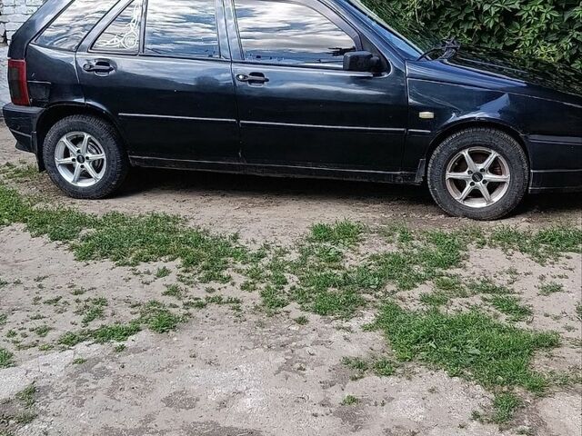 Черный Фиат Типо, объемом двигателя 1.4 л и пробегом 299 тыс. км за 1100 $, фото 1 на Automoto.ua