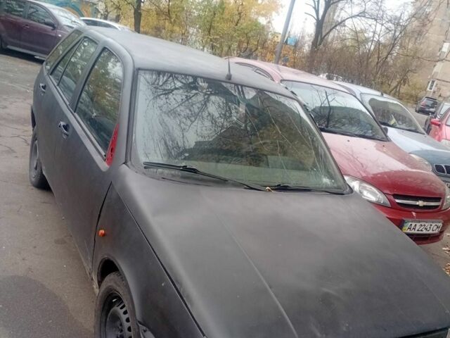 Красный Фиат Типо, объемом двигателя 1 л и пробегом 200 тыс. км за 428 $, фото 1 на Automoto.ua