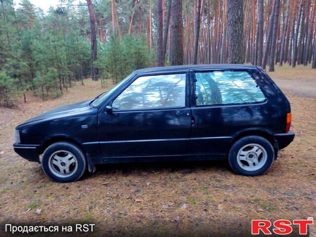 Черный Фиат Уно, объемом двигателя 1 л и пробегом 362 тыс. км за 750 $, фото 1 на Automoto.ua