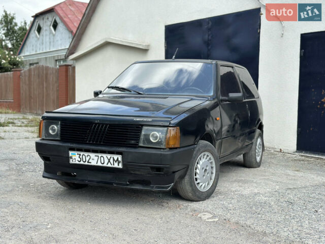 Черный Фиат Уно, объемом двигателя 1 л и пробегом 250 тыс. км за 900 $, фото 1 на Automoto.ua