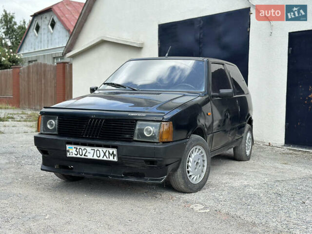 Черный Фиат Уно, объемом двигателя 1 л и пробегом 250 тыс. км за 900 $, фото 1 на Automoto.ua