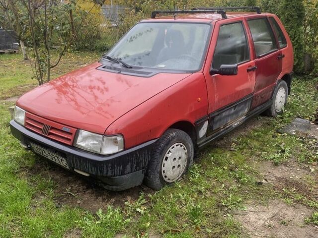 Красный Фиат Уно, объемом двигателя 1.4 л и пробегом 150 тыс. км за 452 $, фото 1 на Automoto.ua