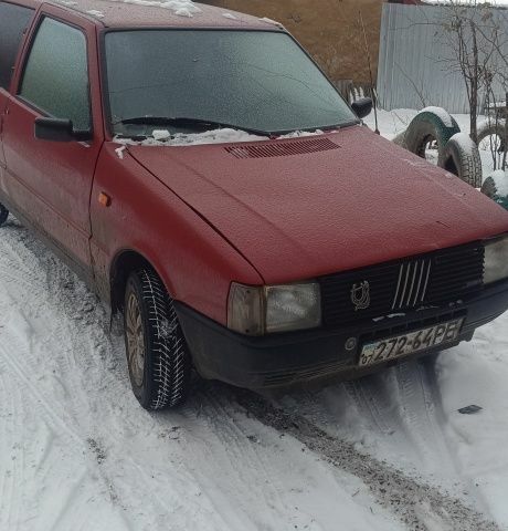 Красный Фиат Уно, объемом двигателя 0 л и пробегом 237 тыс. км за 698 $, фото 1 на Automoto.ua