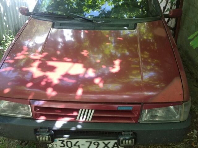 Червоний Фіат Уно, об'ємом двигуна 1 л та пробігом 198 тис. км за 715 $, фото 1 на Automoto.ua