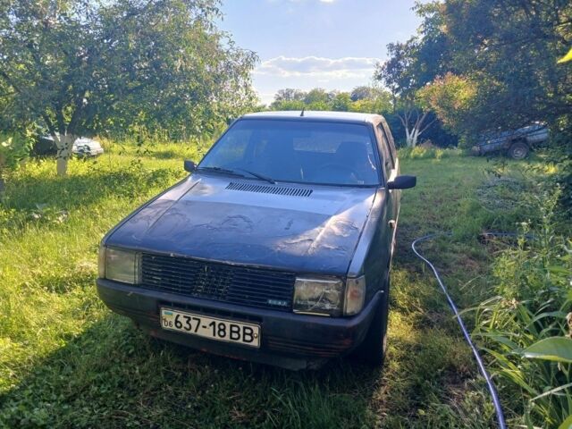 Серый Фиат Уно, объемом двигателя 1 л и пробегом 60 тыс. км за 559 $, фото 1 на Automoto.ua