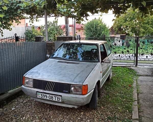Серый Фиат Уно, объемом двигателя 1 л и пробегом 253 тыс. км за 550 $, фото 1 на Automoto.ua