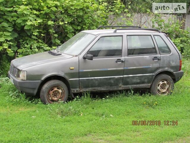 Серый Фиат Уно, объемом двигателя 1.1 л и пробегом 100 тыс. км за 400 $, фото 1 на Automoto.ua