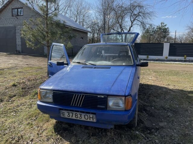Синий Фиат Уно, объемом двигателя 1.5 л и пробегом 226 тыс. км за 226 $, фото 1 на Automoto.ua